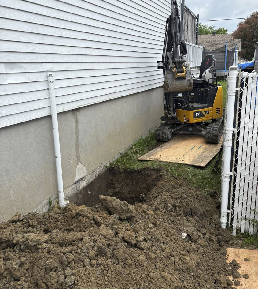 Mini-excavation près d'une fondation